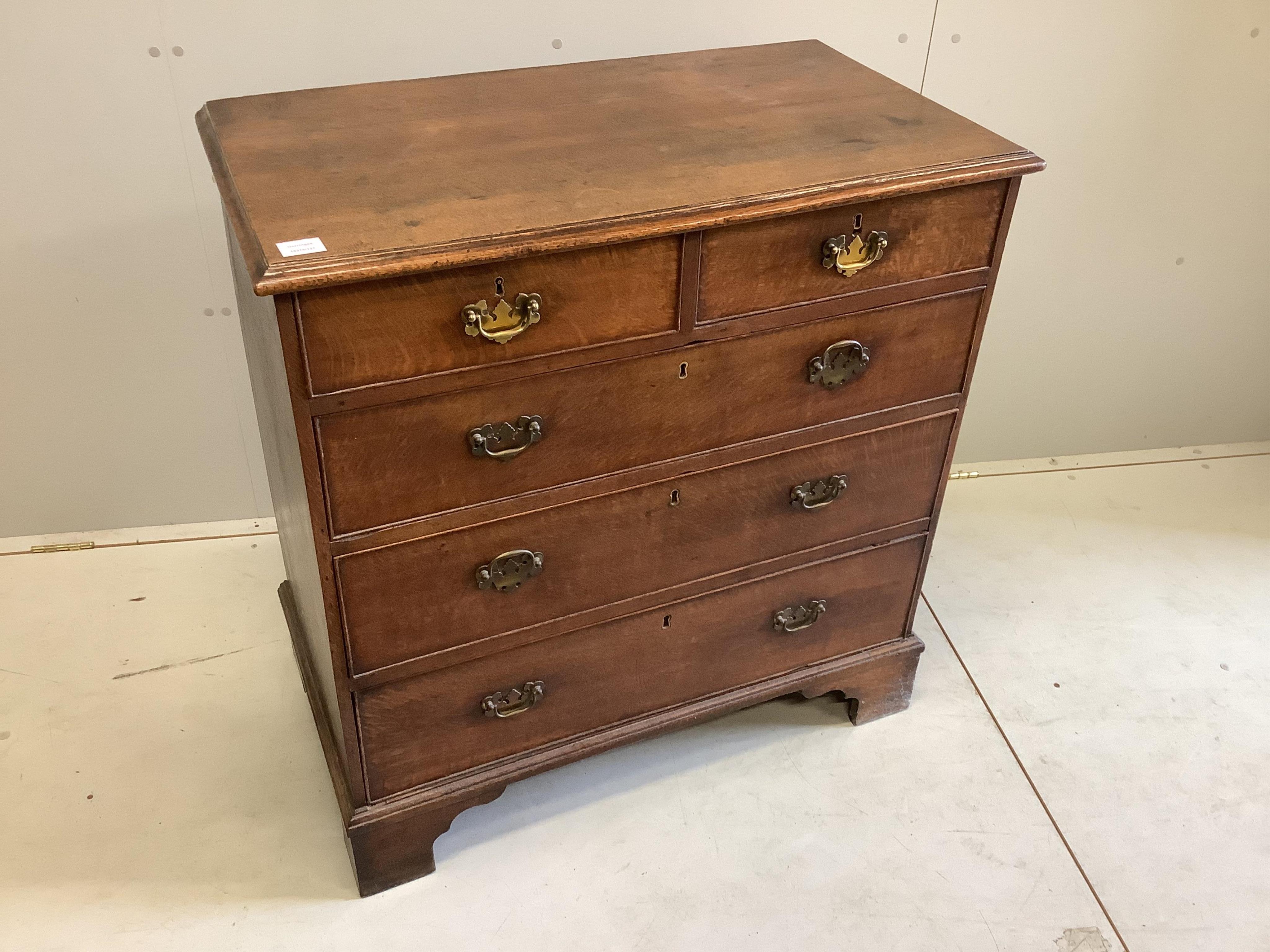 An early 18th century oak chest, fitted with two short and two long drawers, width 91cm, depth 51cm, height 94cm. Condition - fair